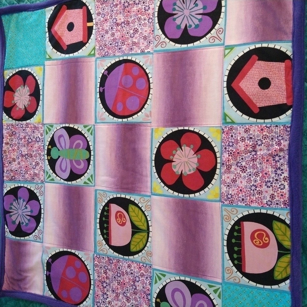 Butterfly and flower. Homemade baby blanket